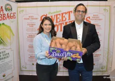 Melissa Whitley and Steven Ceccarelli with Farm Fresh Produce proudly show North Carolina-grown sweet potatoes.